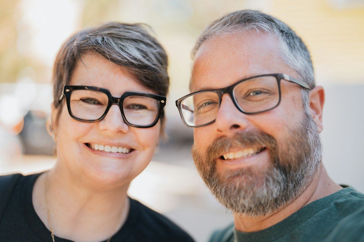 Smiling married couple in their forties